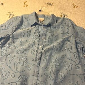 Light blue blouse a.k.a. jacket perfect for travel, front open seven buttons